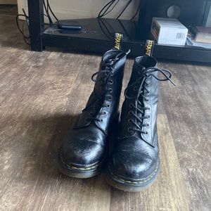 Dr. Martens black and yellow. Already worn in and never gave me blisters.